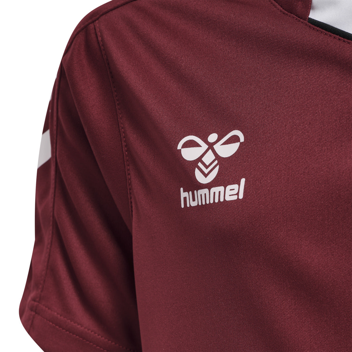 hmlCORE XK POLY JERSEY S/S KIDS MAROON